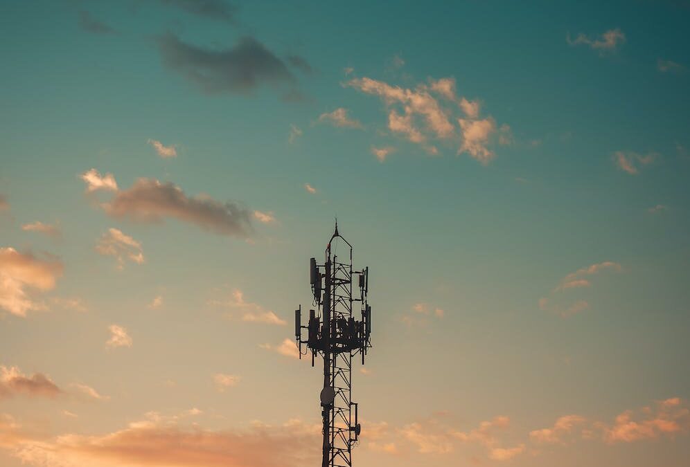 silhouette photography of steel tower